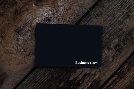 Black Business Card on Woodの写真素材