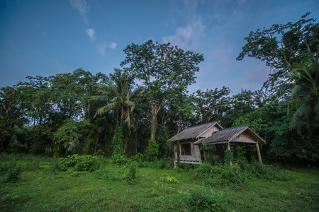 Scenics view of old wooden abandoned cottage against skyの写真素材