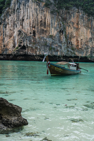 Boat trip to tropical islands. View on beautiful turquoise sea with boat and rocksのeditorial素材