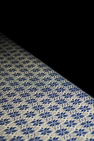 Blue and gold traditional Thai fabric texture background - cultural design tablecloth pattern over...