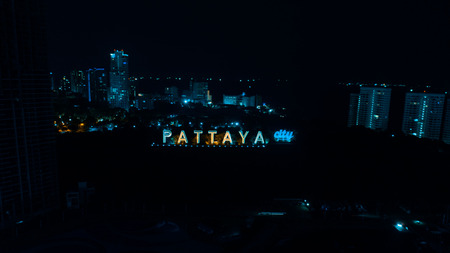 Aerial drone view of colorful Pattaya City sign at nightのeditorial素材