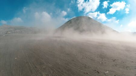 Cinematic panorama of beautiful Mount Bromo volcano with desert in East Java, Indonesiaの写真素材