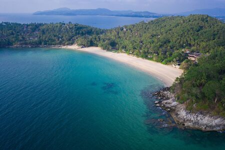 Aerial drone view of tropical empty Surin Beach in Phuket, Thailandの写真素材