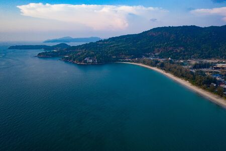 Aerial drone view of tropical Kamala Beach area and Andaman Sea in Phuket, Thailandの写真素材