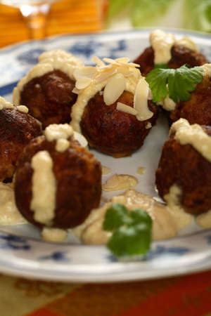 Meatballs with almonds dressing
