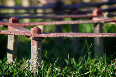 Part of the harrows on green grass