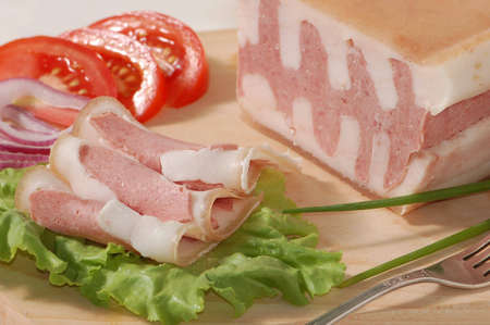 Tasty ham on the chopping board