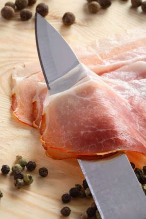 Ham, knife and pepperの写真素材