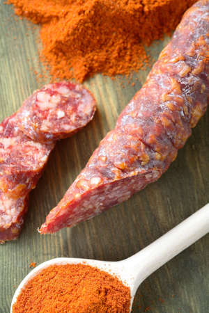 Sausage and chili at the spoonの写真素材