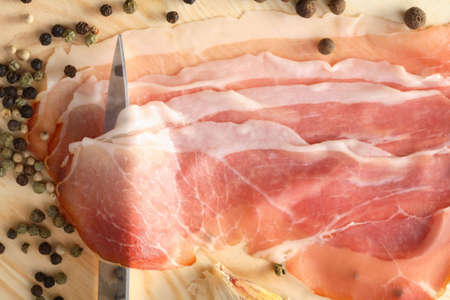 Slices of ham and pepperの写真素材