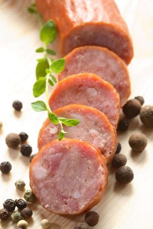 Slices of sausage and pepperの写真素材