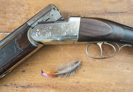 beautiful hunting gun and feather