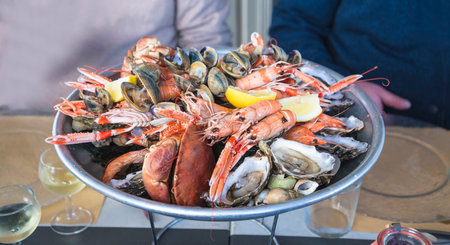 Seafood platter at a fish market in Paris, France