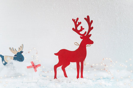 Christmas decoration with reindeer and snowflakes on white backgroundの写真素材