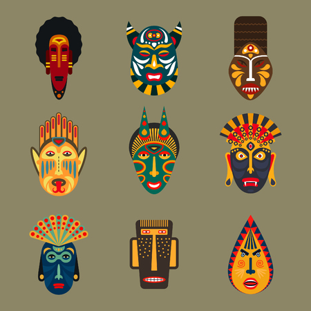 Set of ethnic masks in flat style. Collection of african tribal mask icons.のイラスト素材