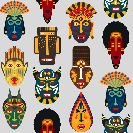 Seamless pattern of ethnic masks in flat style. EPS10 vector background of african tribal masks.のイラスト素材