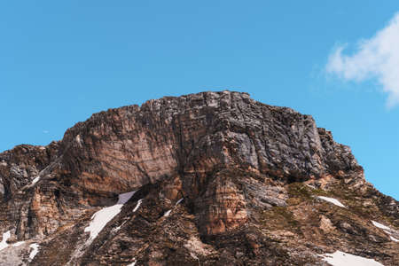 Top of a mountain,big rock, in the alps against blue skyの写真素材