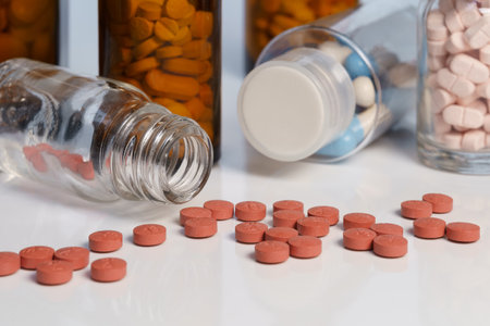 Group of bottles of medicine with pills.の写真素材
