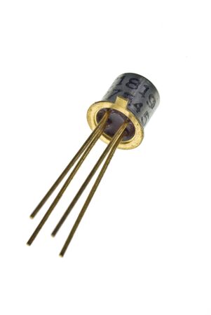 Transistor with 4 leads in metal casing isolated on whiteの写真素材