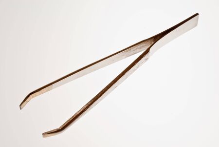 Tweezers on isolated white backgroundの写真素材