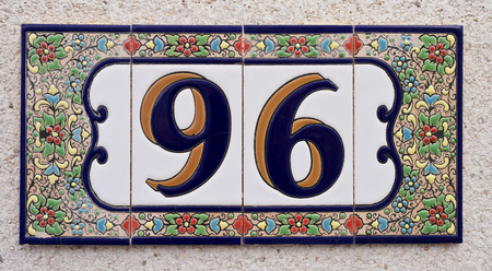 House number Spanish style made up from ceramic tiles