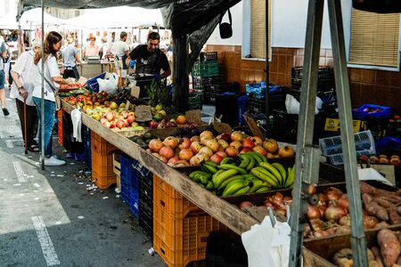 Guardamar, Spain - Oct 3, 2018 : Wednesday is Market day in Guardamar and the streets are lined with stalls.のeditorial素材