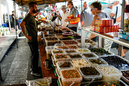 Guardamar, Spain - Oct 3, 2018 : Wednesday is Market day in Guardamar and the streets are lined with stalls.のeditorial素材