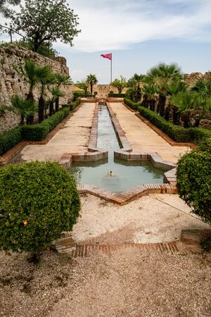 Xativa, Valenciana, Spain - Sept 17 2019 : Ornamental garden of Xativa large castle with fountainsのeditorial素材
