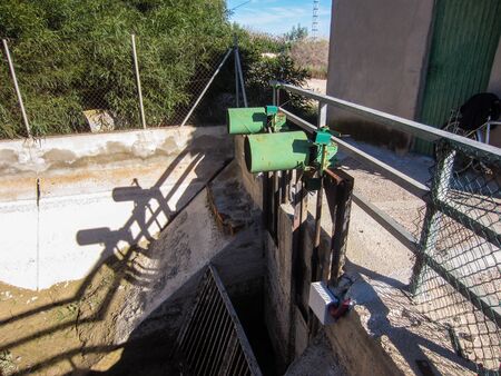 Sluice gate motors for controlling water flow from aquaductの写真素材