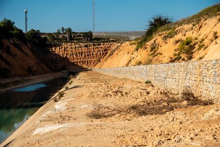 wall built from stones to prevent further landslideの写真素材