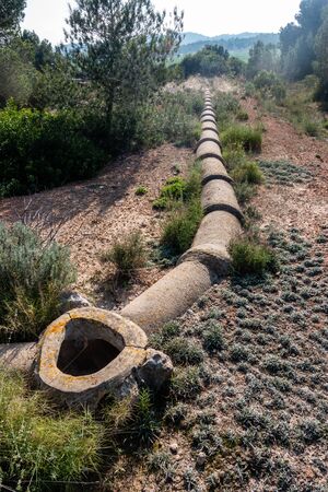 old disused pipework on spanish waste landの写真素材