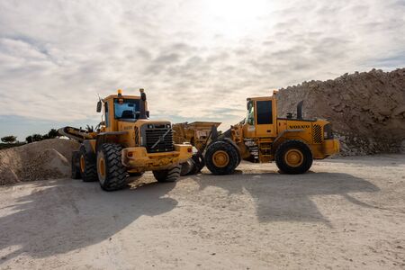 Torrevieja, Alicante, Spain - Jan 17 2020 : Volvo Tractor on builing site in Spainのeditorial素材