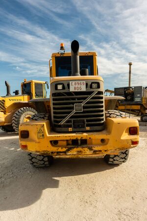 Torrevieja, Alicante, Spain - Jan 17 2020 : Volvo Tractor on builing site in Spainのeditorial素材