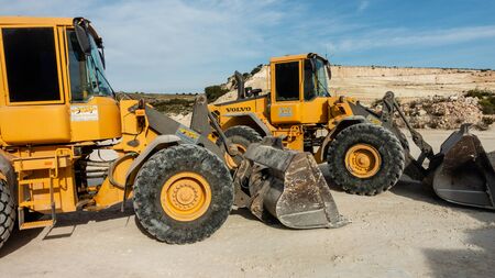 Torrevieja, Alicante, Spain - Jan 17 2020 : Volvo Tractor on builing site in Spainのeditorial素材