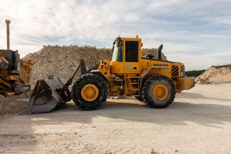 Torrevieja, Alicante, Spain - Jan 17 2020 : Volvo Tractor on builing site in Spainのeditorial素材