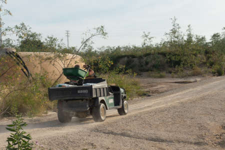 Torrevieja, Valenciana, Spain - May 04 2020 : small E.Z.GO truck vehicle on urbanisation in spainのeditorial素材