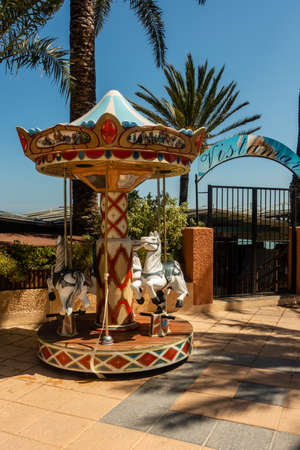 Torre de la Horadada, Valenciana, Spain - June 03 2020 : childrens roundabout outside Vistamar restaurantのeditorial素材