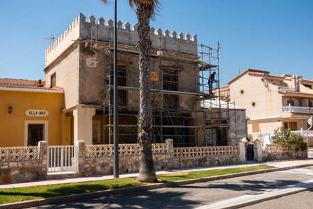 Torre de la Horadada, Valenciana, Spain - June 03 2020 : House being restored to original by local buildersのeditorial素材