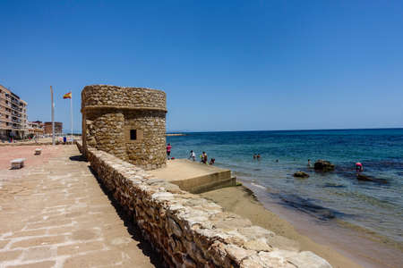 La Mata, Valenciana, Spain - June 22 2020 : Beach and town during covid distancingのeditorial素材