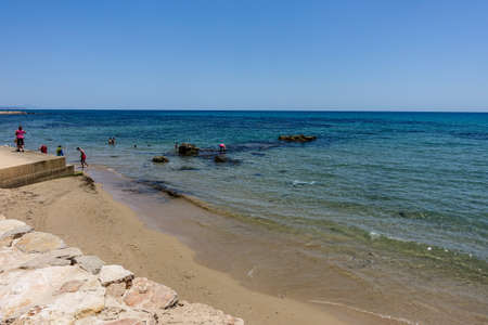 La Mata, Valenciana, Spain - June 22 2020 : Beach and town during covid distancingのeditorial素材