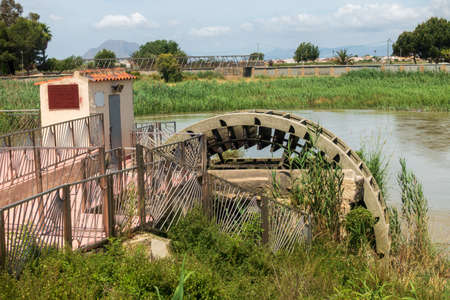 Water Wheel pump used to provide water for Orchard irrigation