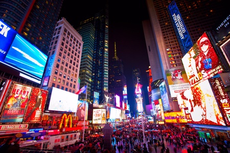 NEW YORK CITY - OCT 13: Times Square, is a busy intersection of art and commerce where electronic,...