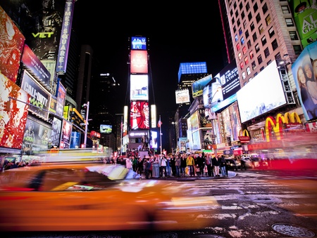 NEW YORK CITY - NOV 13: Times Square ,is a busy tourist intersection of neon art and commerce and is...