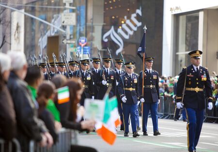 NEW YORK, NY, USA MAR 17: Marching US miltary soldiers at the St. Patrick's Day Parade on March 17,...