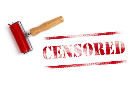 censored red ink with ink rollerの写真素材