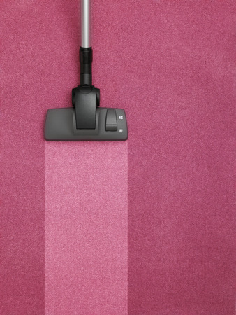 Vacuum Cleaner cleaning the carpetの写真素材