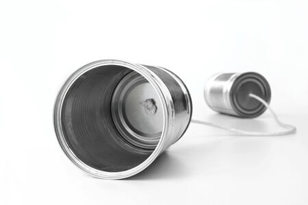 Tin Can Telephone on whiteの写真素材