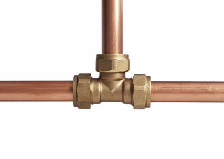 Copper pipe on white with connectorの写真素材