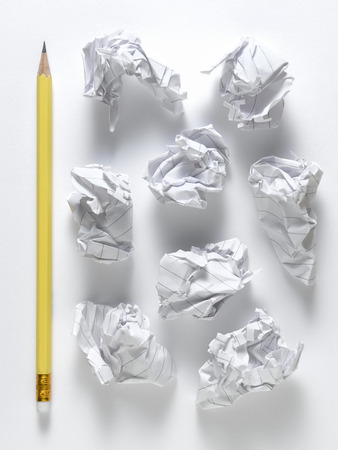 Yellow pencil isolated on a white backgroundの写真素材