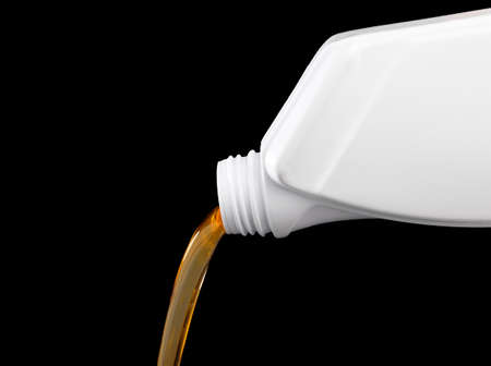 Oil can pouringの写真素材